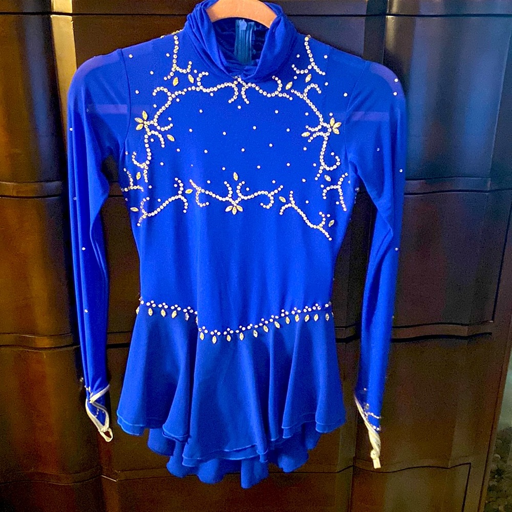 Custom Figure Skating dress in royal blue. In perfect condition.